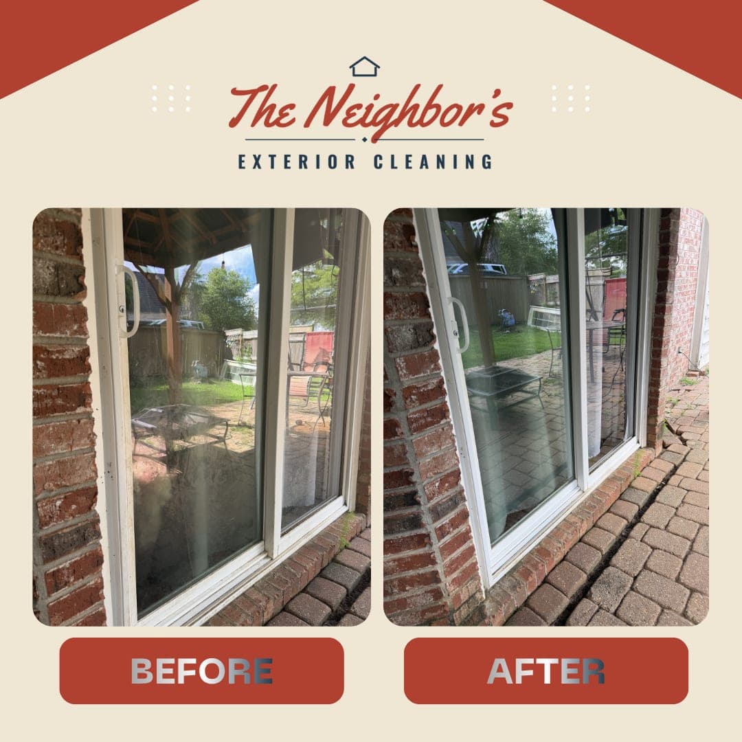 Before and after: a spotted sliding glass door with a brick surround cleaned to clear glass